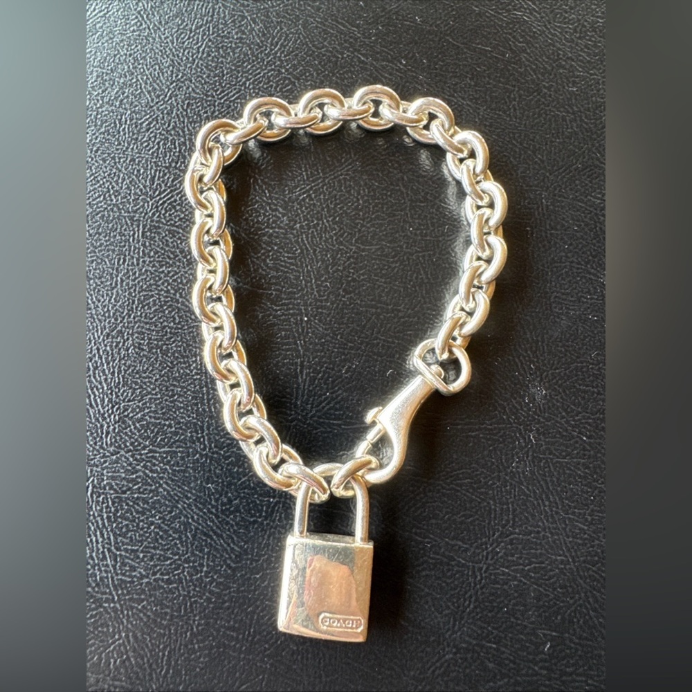 COACH sterling silver padlock charm bracelet NEW RARE
